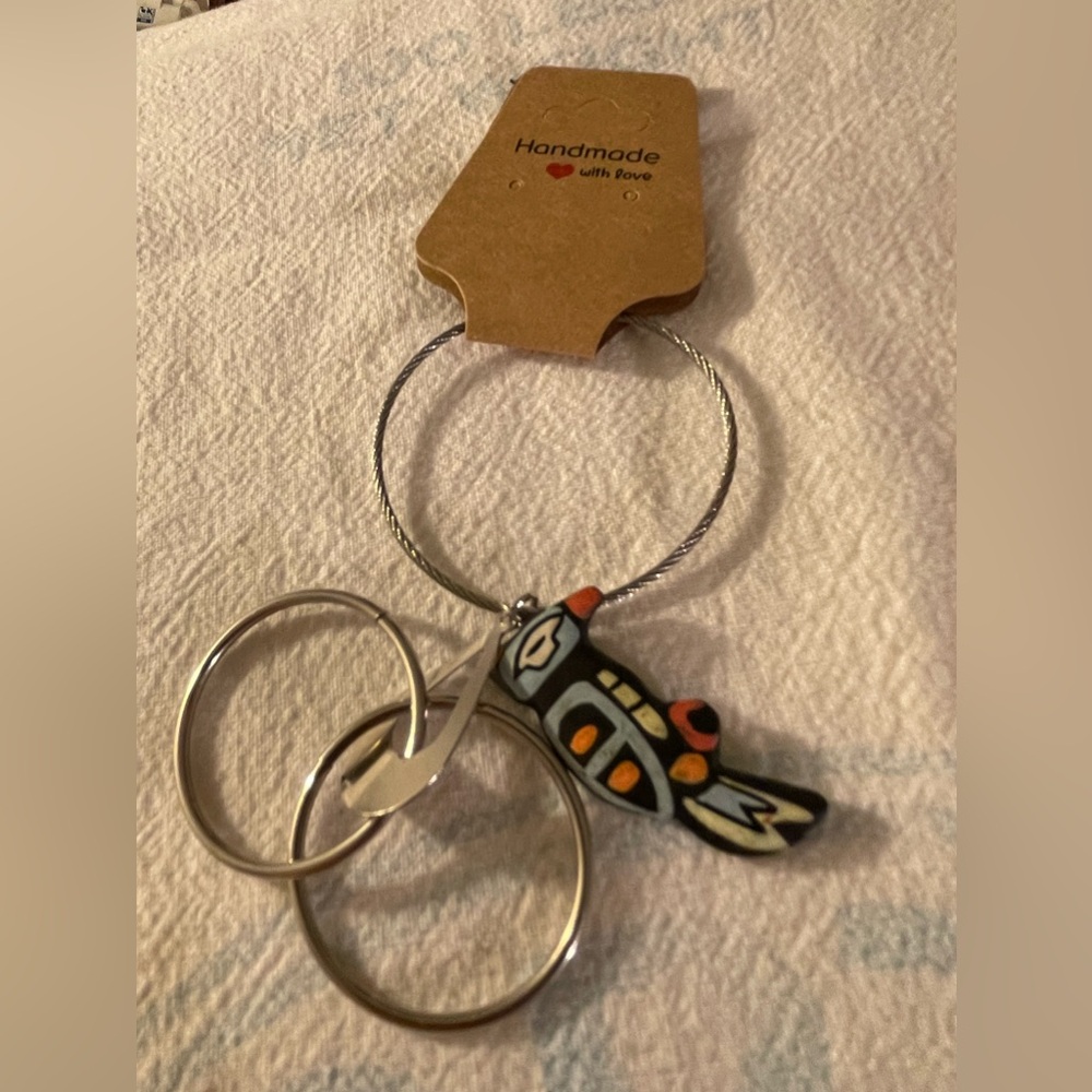 Vintage bird and silver dangle